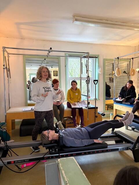 Claire teaching Polestar Comprehensive whole body pelvic health method
